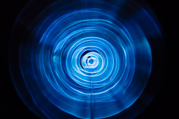 Sound waves in the dark. Blue color