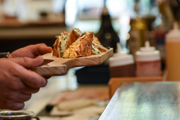 Pastry breakfast cake and dessert. People in a bakery tasting the pastry specialties 