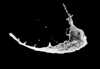 White foam bubble soap shampoo splash explosion in the air on black background,freeze stop motion photo object design