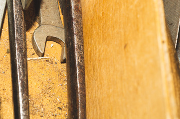 Wrench in a wooden tool box. work instrument