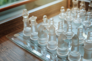 Chess is placed on a table for the evening entertainment adds stress and loneliness, brain development. soft focus