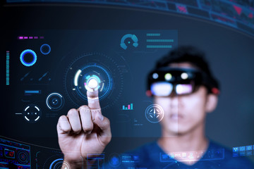 Using VR glass to enter virtual reality world. Future Technology Magic Equipment. Men controls interfaces in augmented reality world
