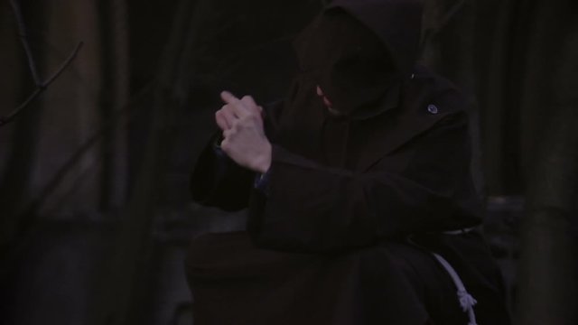 Malefic Wizard Performs A Rite Using Secret Hand Movements