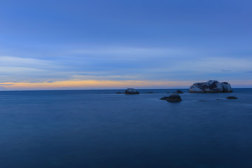 Fototapeta na wymiar Sunset in Tanjung Tinggi beach, Belitong, Indonesia