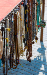 Tibetan prayer chain hanging on a souvenir stall in Nepal