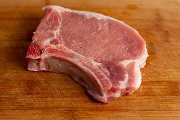 raw meat on a cutting board
