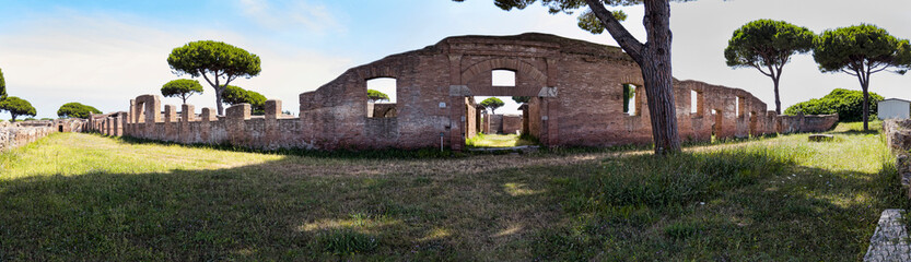 Fototapeta na wymiar Panoramic 180 degrees outside the Garden Houses located in the archaeological excavations of Ostia Antica in Rome