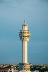 Skyscraper with bright blue sky in morning.