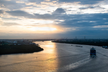 Sky river and ocean view with isolated cruise at dusk.