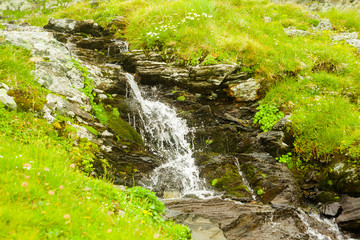 stream and waterfall in nature