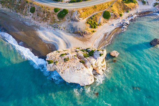 Island of Cyprus. The view from the drone to the rock of Aphrodite. Petra-Tu-Romiou. The coast of the Gulf of Aphrodite. Mediterranean sea from above. Seascape. Pathos. Kuklia. Turquoise water. © Grispb