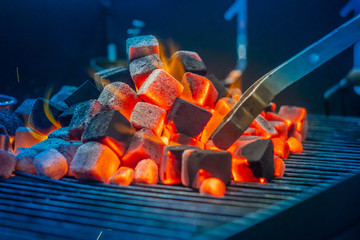 Coals for hookah. Hookah Smoking. Warming up the coals on a special grill. Hookah bar for Smoking...