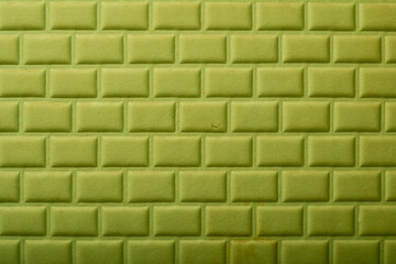 Fototapeta premium Green brick texture, wallpaper with brick emulation