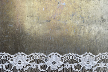 White lace border on grunge background with copy space