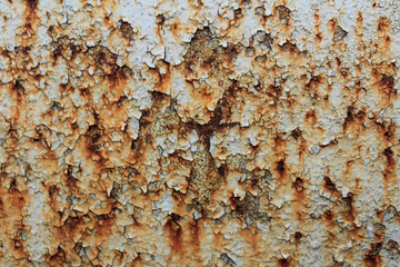 Rust stains on a gray painted iron surface