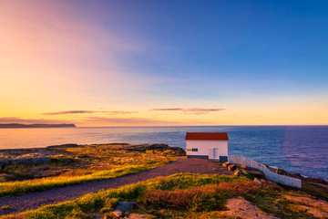 View of Cape Spear Lighthouse National Historic Site at Newfoundland Canada during sunset