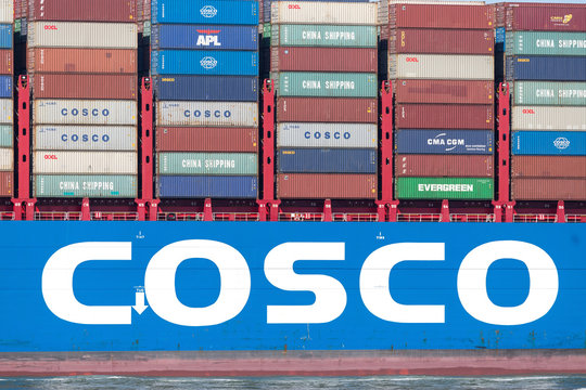 MAASVLAKTE, THE NETHERLANDS - JULY 1, 2019: COSCO SHIPPING LIBRA inbound Rotterdam. COSCO is a Chinese state-owned shipping and logistics services supplier company.