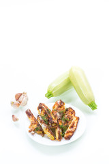 oven-baked zucchini in batter with garlic and herbs