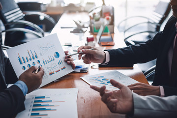 Group of business people at meeting assessment the state of business investment and marketing.