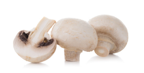 mashrooms whole and sliced champignons isolated on white background