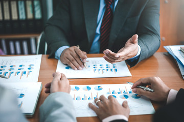 Group of business people at meeting assessment the state of business investment and marketing.