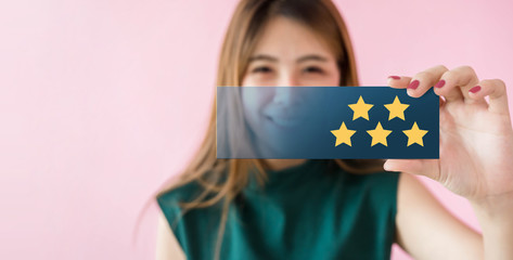 Customer Experiences Concept. Happy Woman Smiling and Show Excellent Rating with Five Star icon for her Satisfaction on Transparent Card