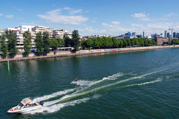 Fototapeta premium Modern architecture of a city on the banks of a river