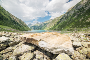 Lake in the Alps in a rocky environment