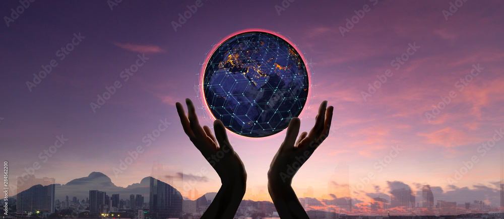 Poster hands holding earth and circle global network connection with data exchanges worldwide on city sunse