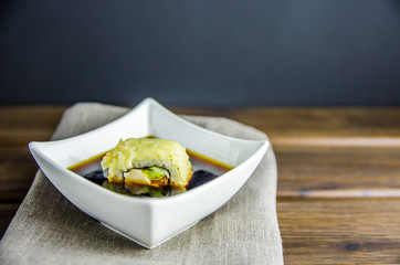roll with cheese, chicken in soy sauce