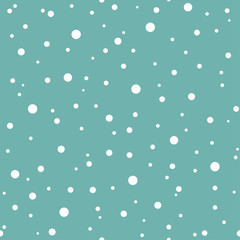 Winter seamless pattern. Sky with flat white snow dots on powder blue background. New Year backdrop.
