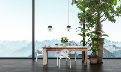 Modern dining table with a view of mountain peaks