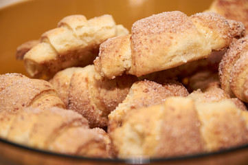 freshly baked croissants with sugar