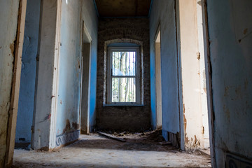 Fototapeta na wymiar doors and window of an abandoned house