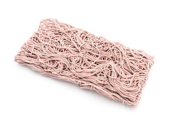 Chinese traditional staple food not yet cooked on a square dry purple noodle, on a white background