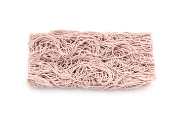 Chinese traditional staple food not yet cooked on a square dry purple noodle, on a white background