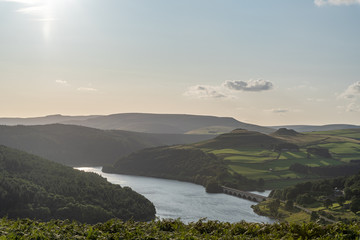 View of the Ashopton Viaduct, Ladybower Reservoir, and Crook Hill in the Derbyshire Peak District National Park.