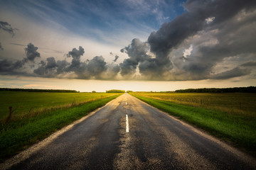 Storm clouds over the country road