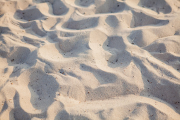 Fine beach sand in the summer sun