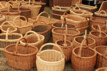 a large group of different wicker baskets outdoors