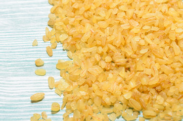 Uncooked bulgur close-up, healthy eating concept, food background