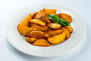 rustic french fries slices on a light background