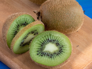Fresh kiwi fruits   on the wooden table