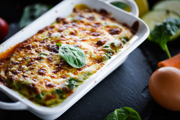 spinach lasagna with fresh vegetables