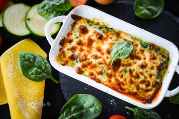 spinach lasagna with fresh vegetables