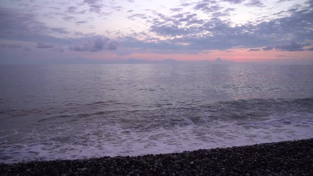 Black sea waves, Kvariati beach on a beautiful sunset.