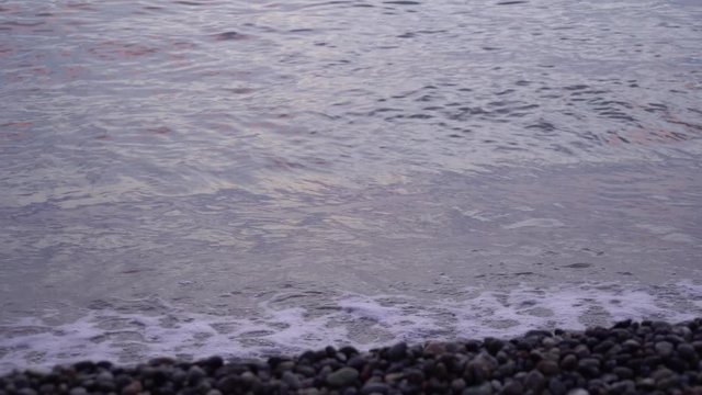 Black sea waves, Kvariati beach on a beautiful sunset.