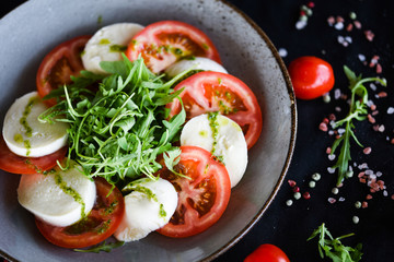 italian caprese salad with fresh mozzarella, tomatoes & basil