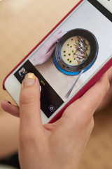 Photographs dishes on the phone closeup color photograph