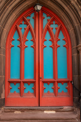 Fototapeta premium Orange and Blue Arched Church Doors